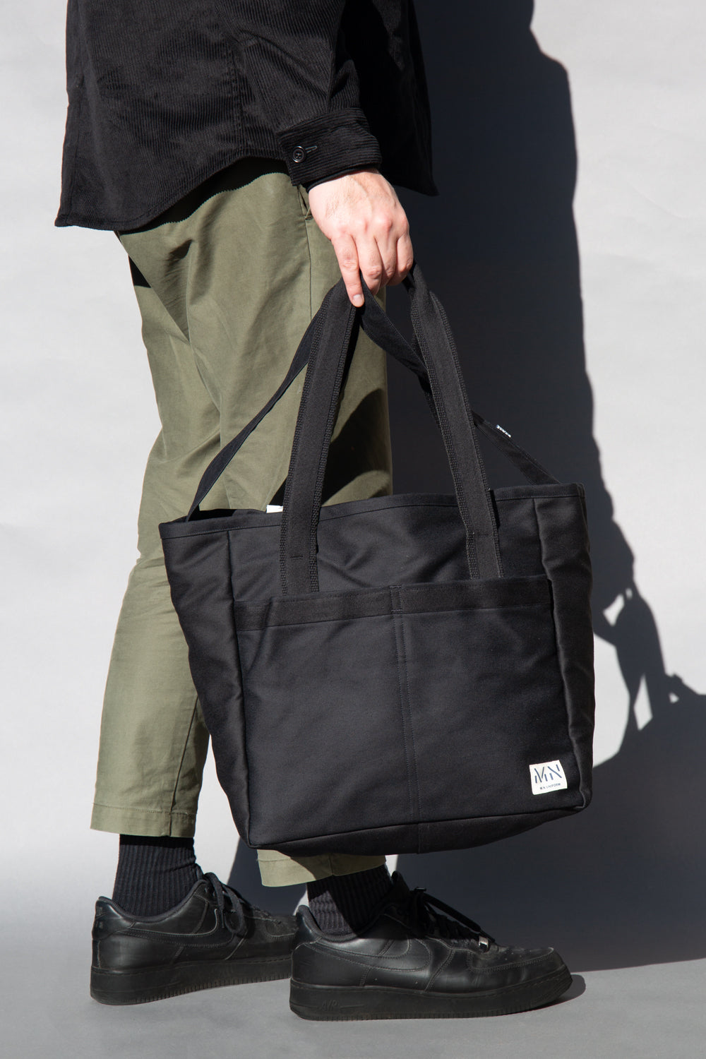 M.N Black Carryall Bag